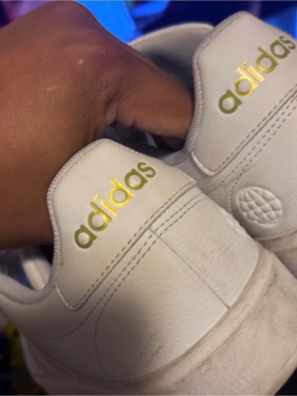 Nike White Sneakers with Gold Accents
